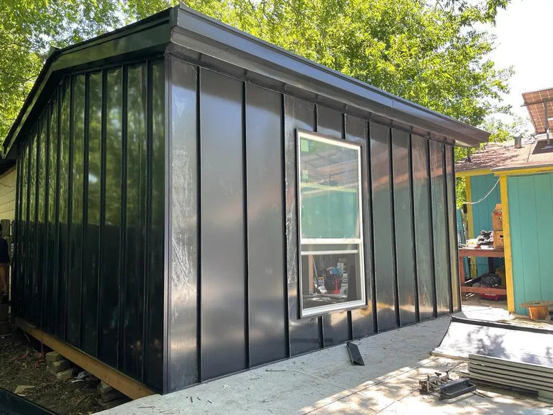 Black standing seam metal wall panels for Roof Inspection in Vancouver