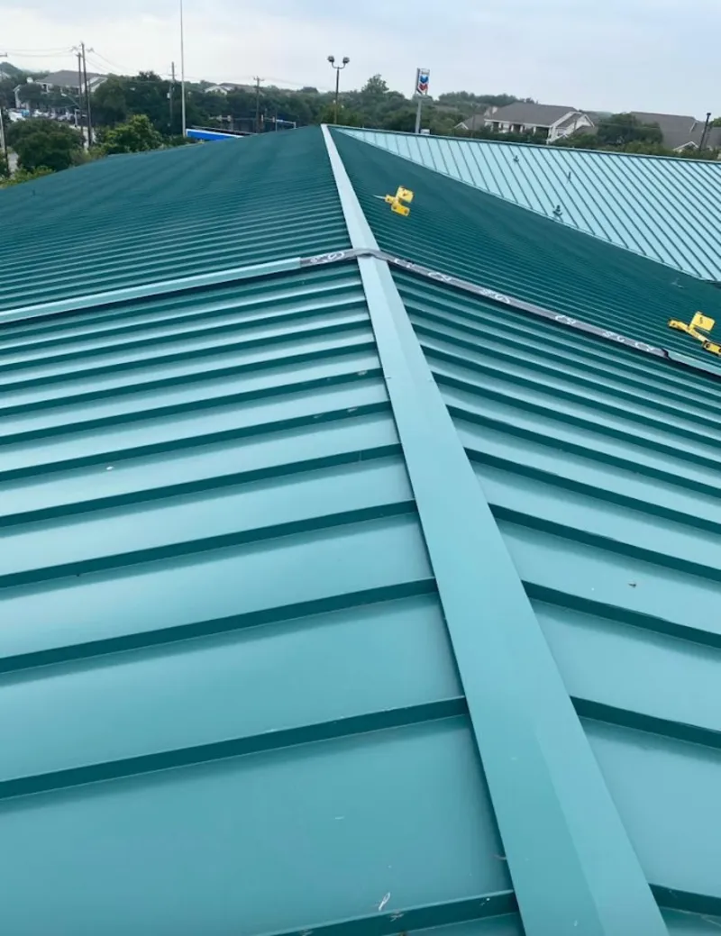 Green commercial metal roof ridge and valley for Metal Roof Repair in Vancouver